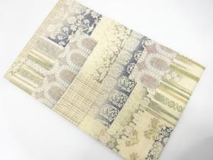 未使用品　花唐草に抽象動物・桐模様　名古屋帯